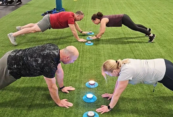 Physical Development Center Four People Plank Training