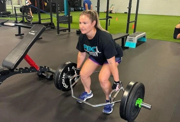 Physical Development Center Woman doign Deadlifts